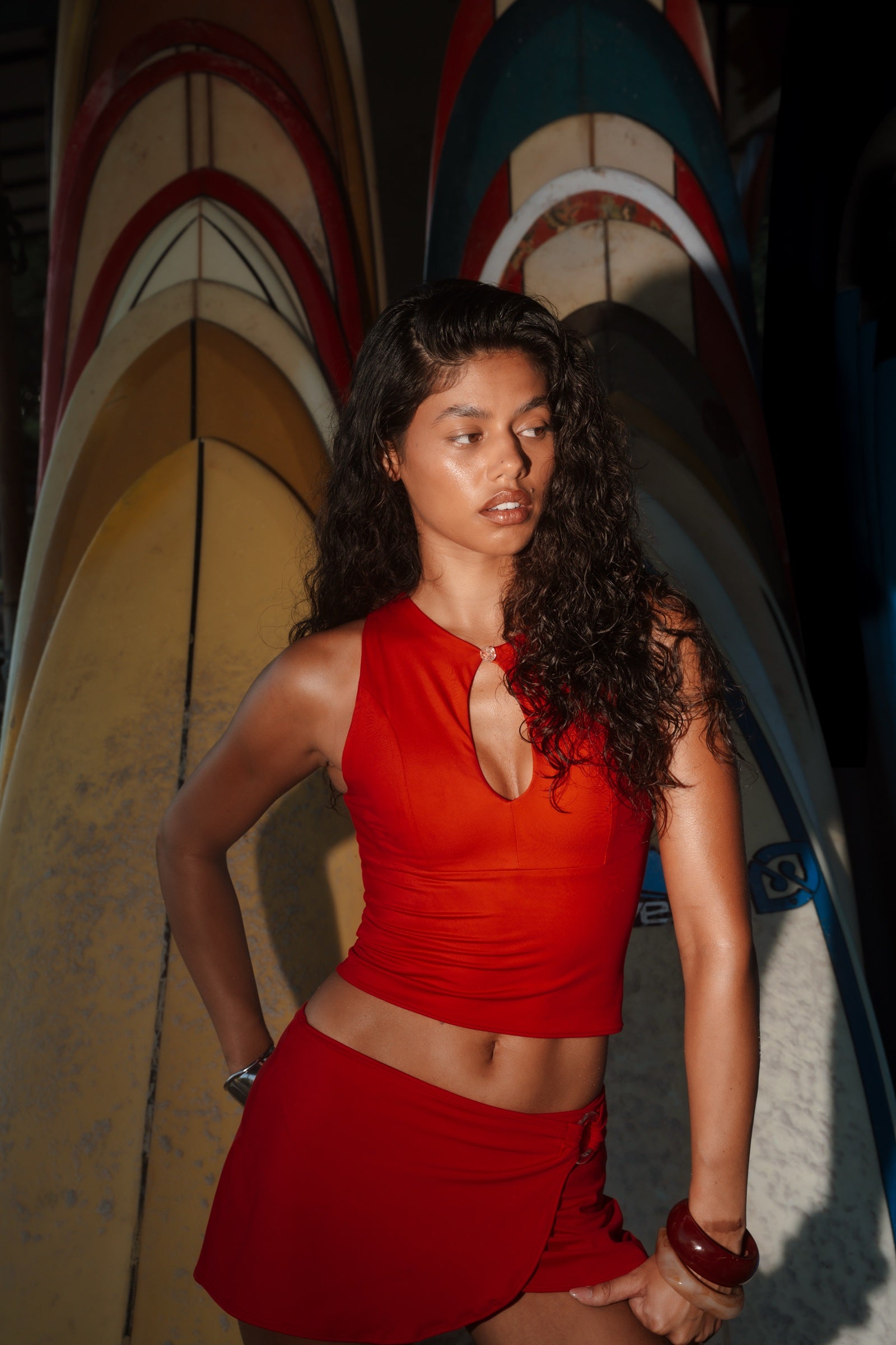 Surf Atelier — model with surfboards